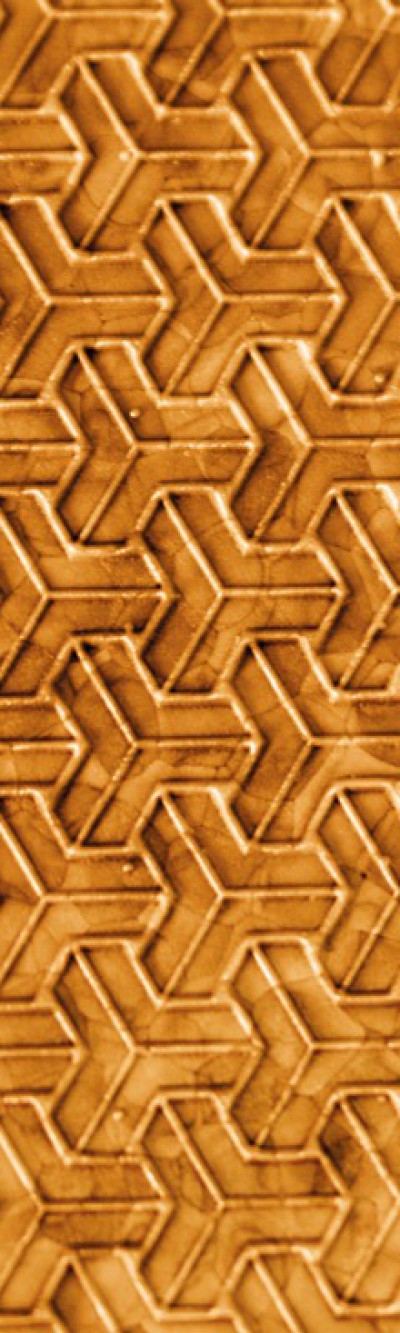 Nahaufnahme von goldfarbigem EPP. Das Muster besteht aus verschachtelten T-förmigen Elementen.